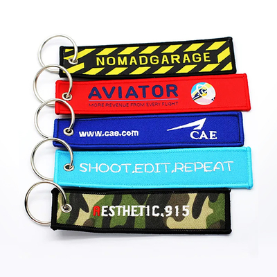 Đèn nhẹ Logo tùy chỉnh Jet Tags vải in thêu Key Ring thêu Keychain