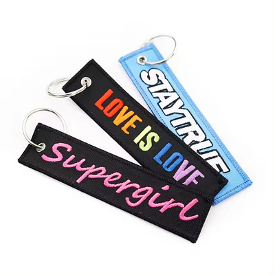 Nhựa thêu keychain với logo tùy chỉnh quảng cáo thời trang vải dệt key tag keychain